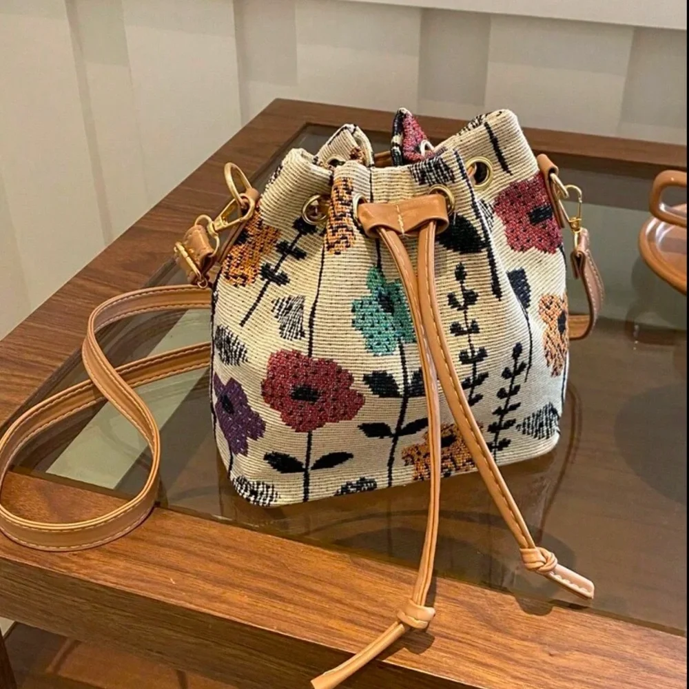 Floral print canvas bucket bag purse with brown leather accents & strap | NEW